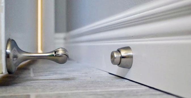 Ограничители для двери: виды и особенности конструкций